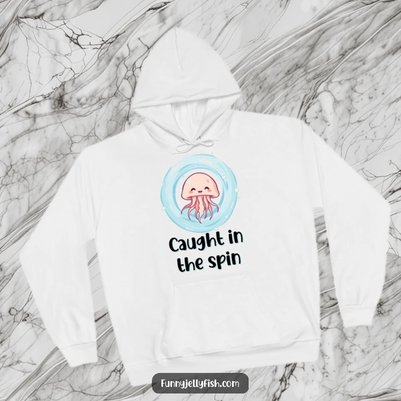 Funny kawaii jellyfish giggling as it spins rapidly in a water vortex, featured on this soft and cozy hoodie.