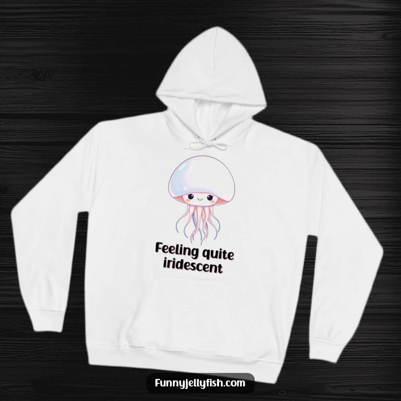 Funny kawaii jellyfish peeking from behind a shimmering giant pearl, this hoodie is soft, warm, and hilariously cute.