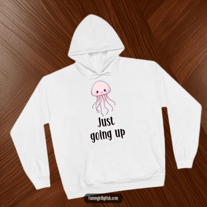 Funny kawaii jellyfish with wiggly tentacles floating joyfully inside a bubble, featured on this soft and cozy hoodie.