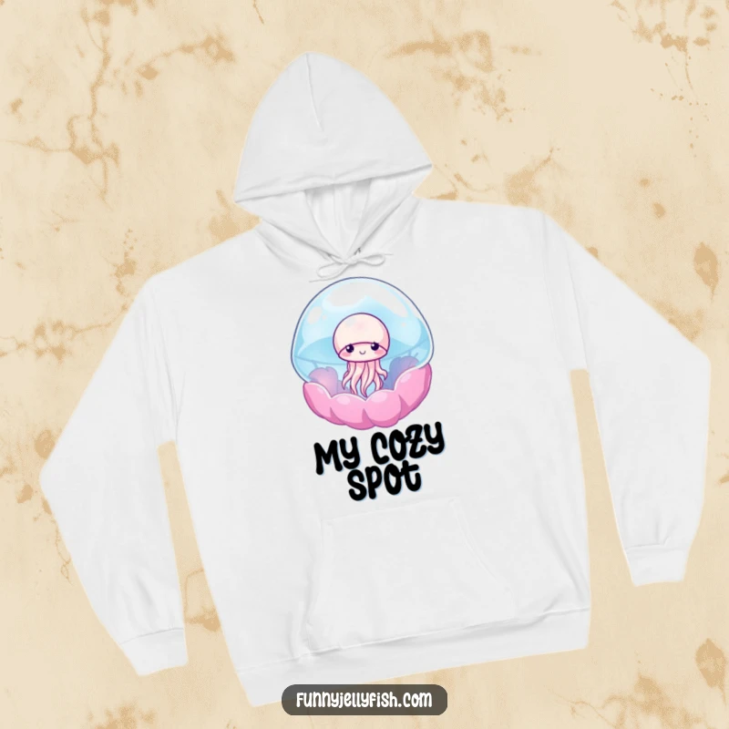 Funny hoodie depicting a shy jellyfish peeking out from a colorful, see-through anemone, providing warmth and whimsical charm.